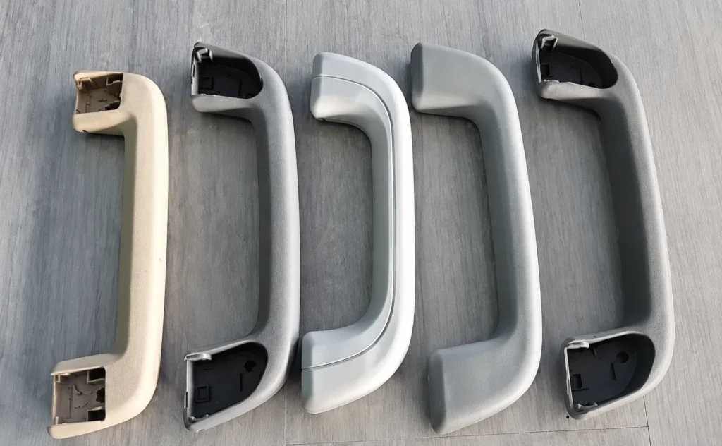 Hollow ergonomic grips made with gas-assisted injection molding