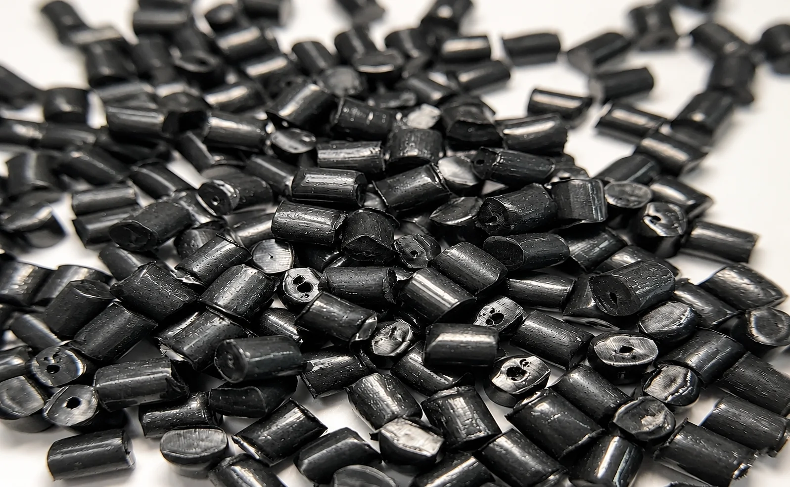 Thermoplastic material selection for gas-assisted injection molding